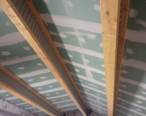 Charpente naïl-web et panneau porteur isolant